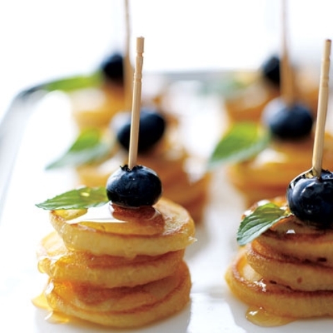 Mini pancake skewers with blueberries, adorable!
