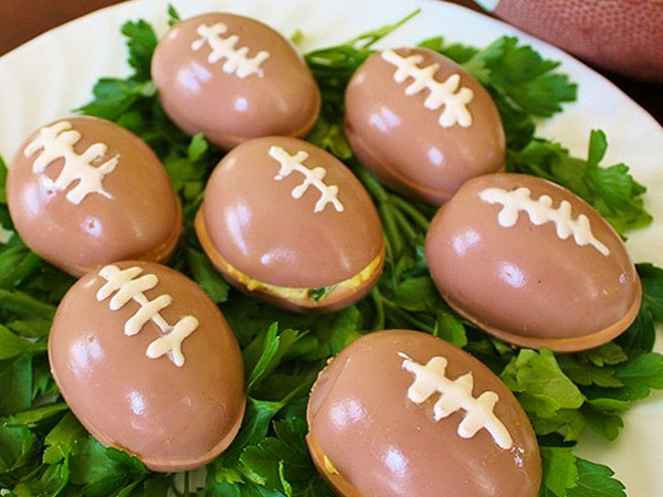 Football shaped appetizer eggs