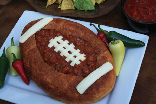 Football shaped bread bowl and chil for football party