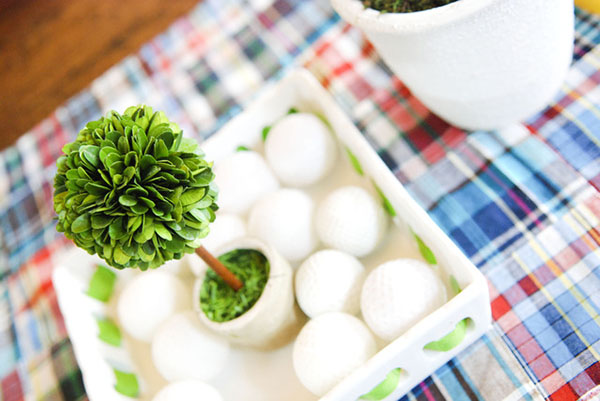Love the use of golf balls in this Golf Party centerpiece!