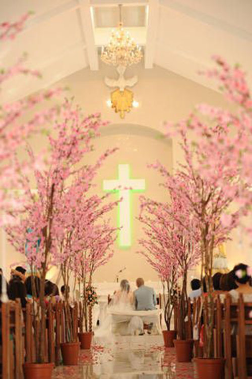 Cute indoor chapel with blossoming trees!