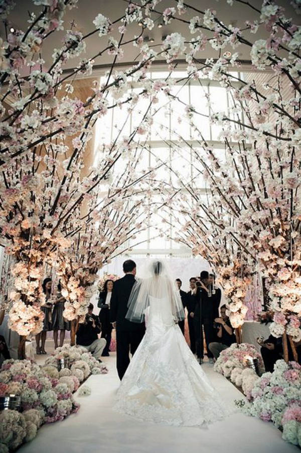 Love these white blossoming trees at this wedding ceremony