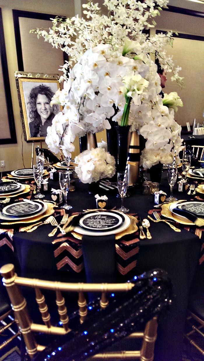 My Favorite Tablescape Black and gold Modern table with tons of floral- B. Lovely Events