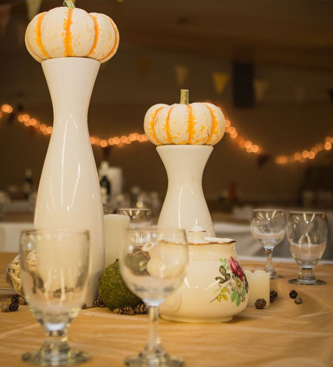 Mini Pumpkin centerpieces for a fall wedding!