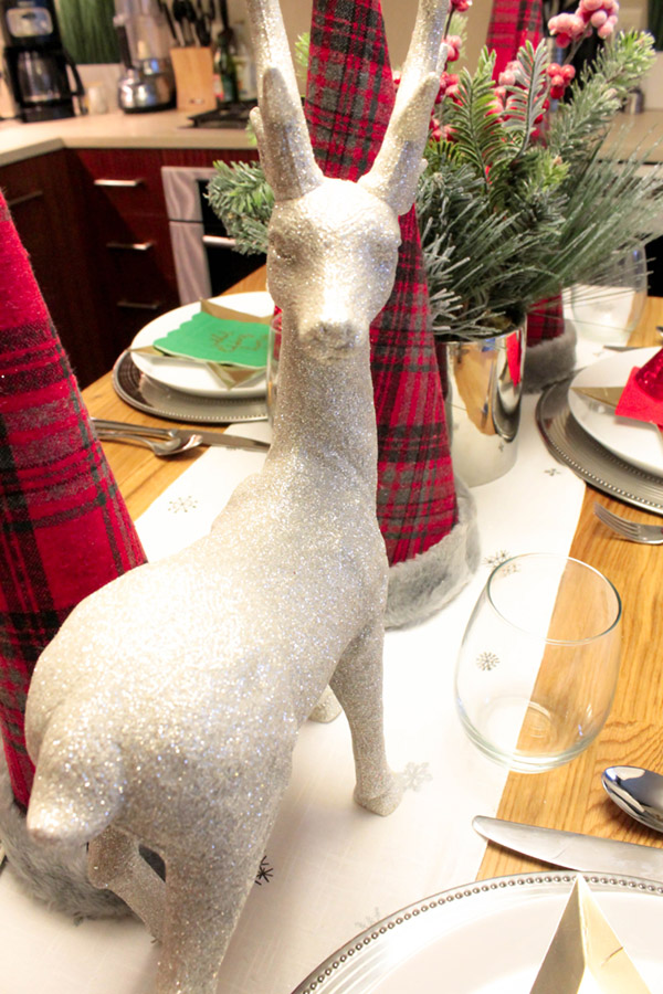 This reindeer is too cute on this chirstmas tablescape from B. Lovely Events