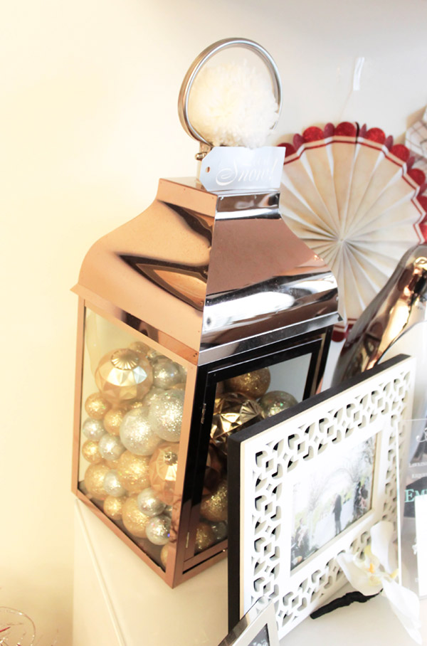 Copper lanterns make gorgeous Christmas decor- See more Holiday home tour on B. Lovely Events