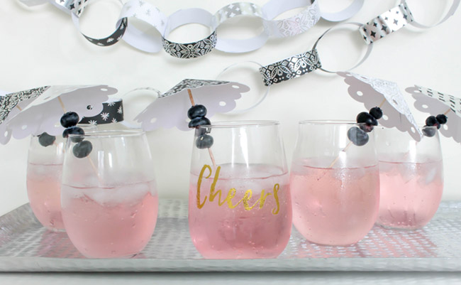 DIY Drink Umbrellas & paper chains! Learn how to make them on B. Lovely Events!