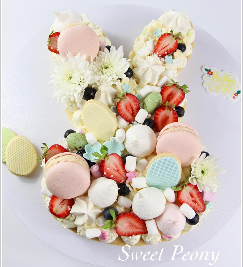 Easter Cookie Cake- So amazing! - See more of our favorite cookie cakes on B. Lovely Events
