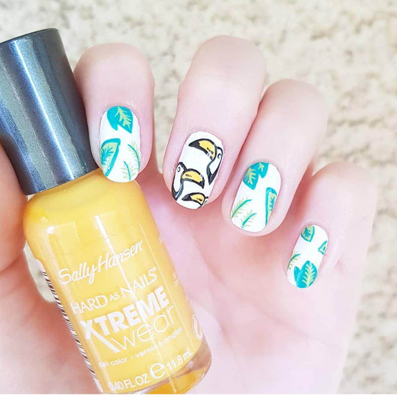 These toucan nails are so fun! - See More Toucan Party Ideas at B. Lovely Events