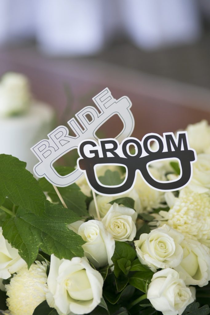 Bride and groom photobooth props- See all the beautiful details on B. Lovely Events! #wedding #realwedding #weddingideas #weddingtips #weddingdecorations
