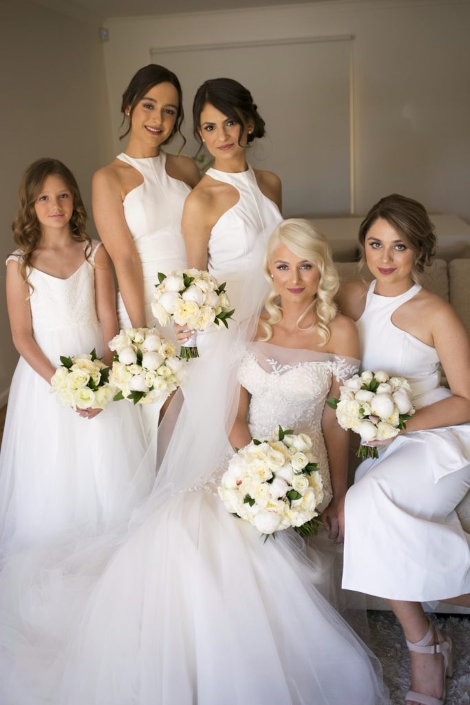 Love the all white bridesmaids dresses - See all the beautiful details on B. Lovely Events! #wedding #realwedding #weddingideas #weddingtips #weddingdecorations