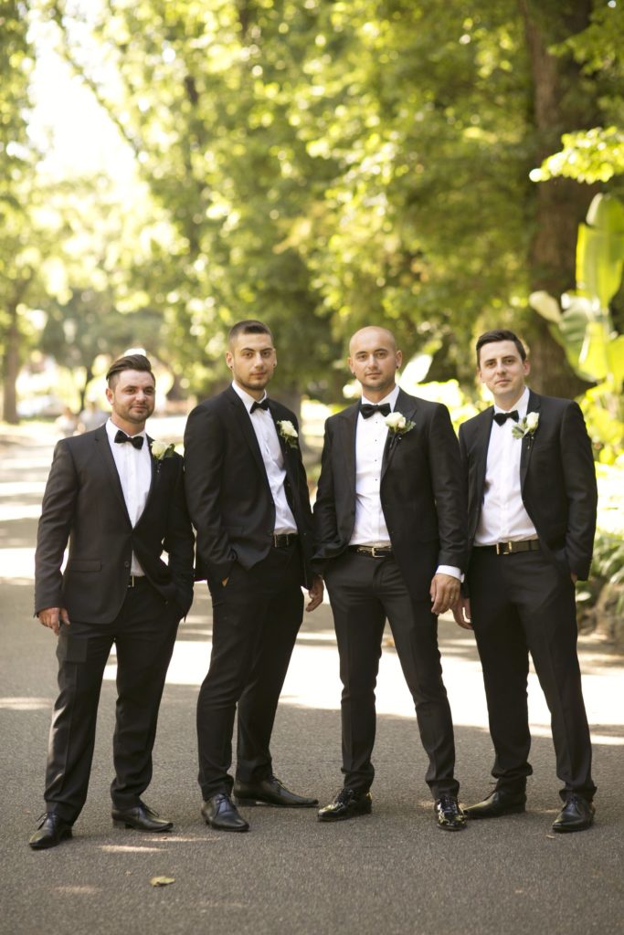 Real Wedding Belinda and michales all white wedding Groomsmen shot - See all the beautiful details on B. Lovely Events! #wedding #realwedding #weddingideas #weddingtips #weddingdecorations