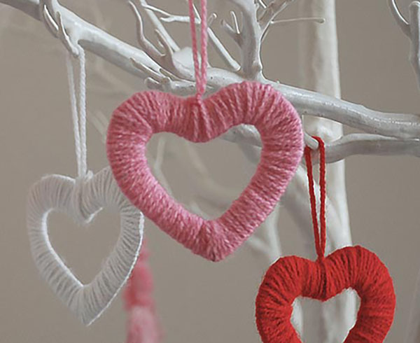 Hanging yarn heart decorations